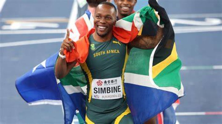 Akani Simbine is disqualified.