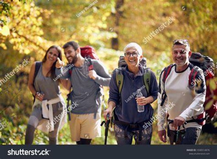 group of people hiking a rocky trail in oregon