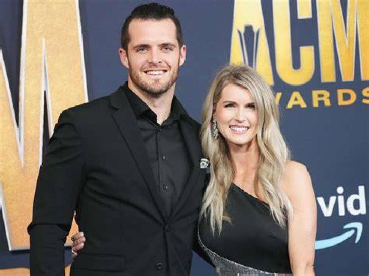 Heather Neel with Derek Carr and two of their kids