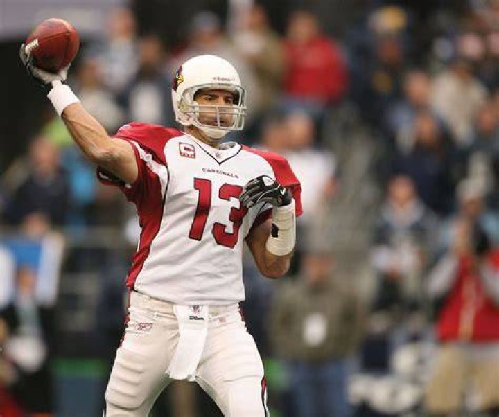 Kurt Warner in football jersey